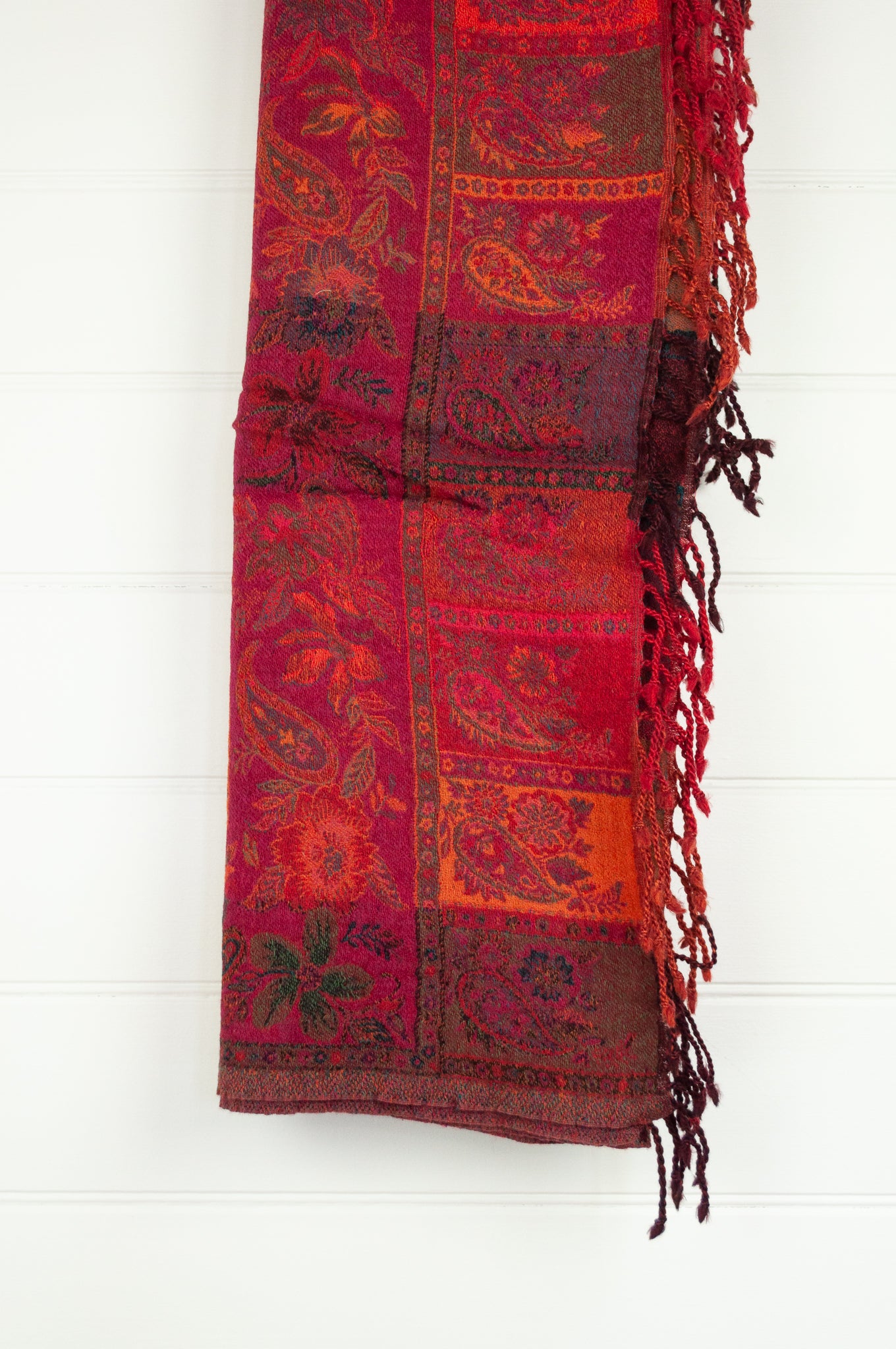Tasseled wool throw - magenta floral