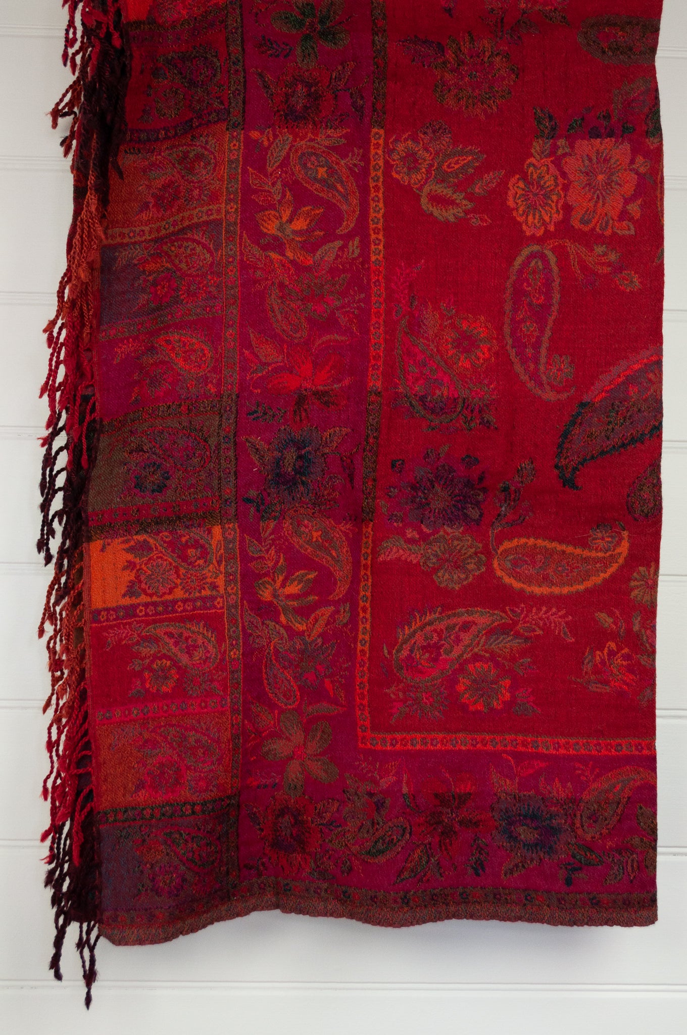 Tasseled wool throw - magenta floral