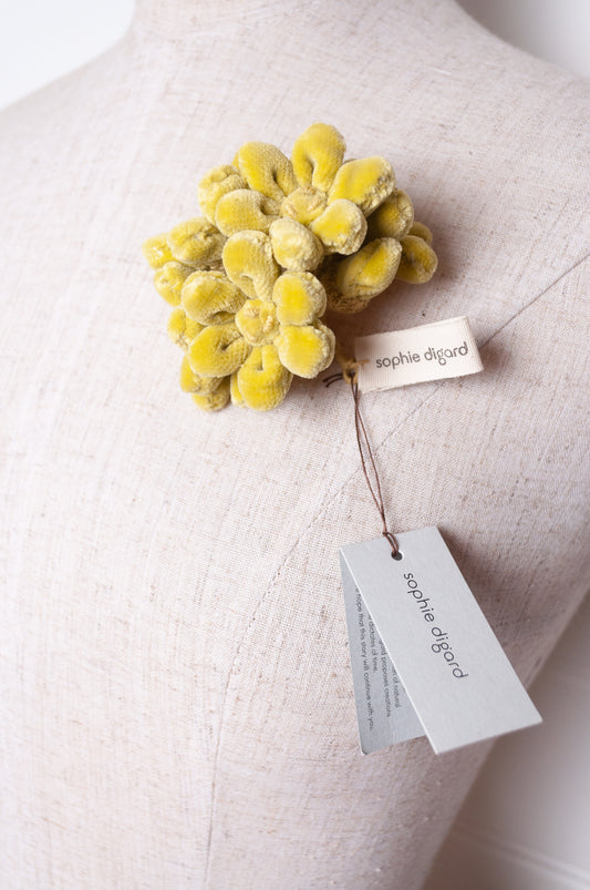 Sophie Digard velvet jonquille brooch in lime green.