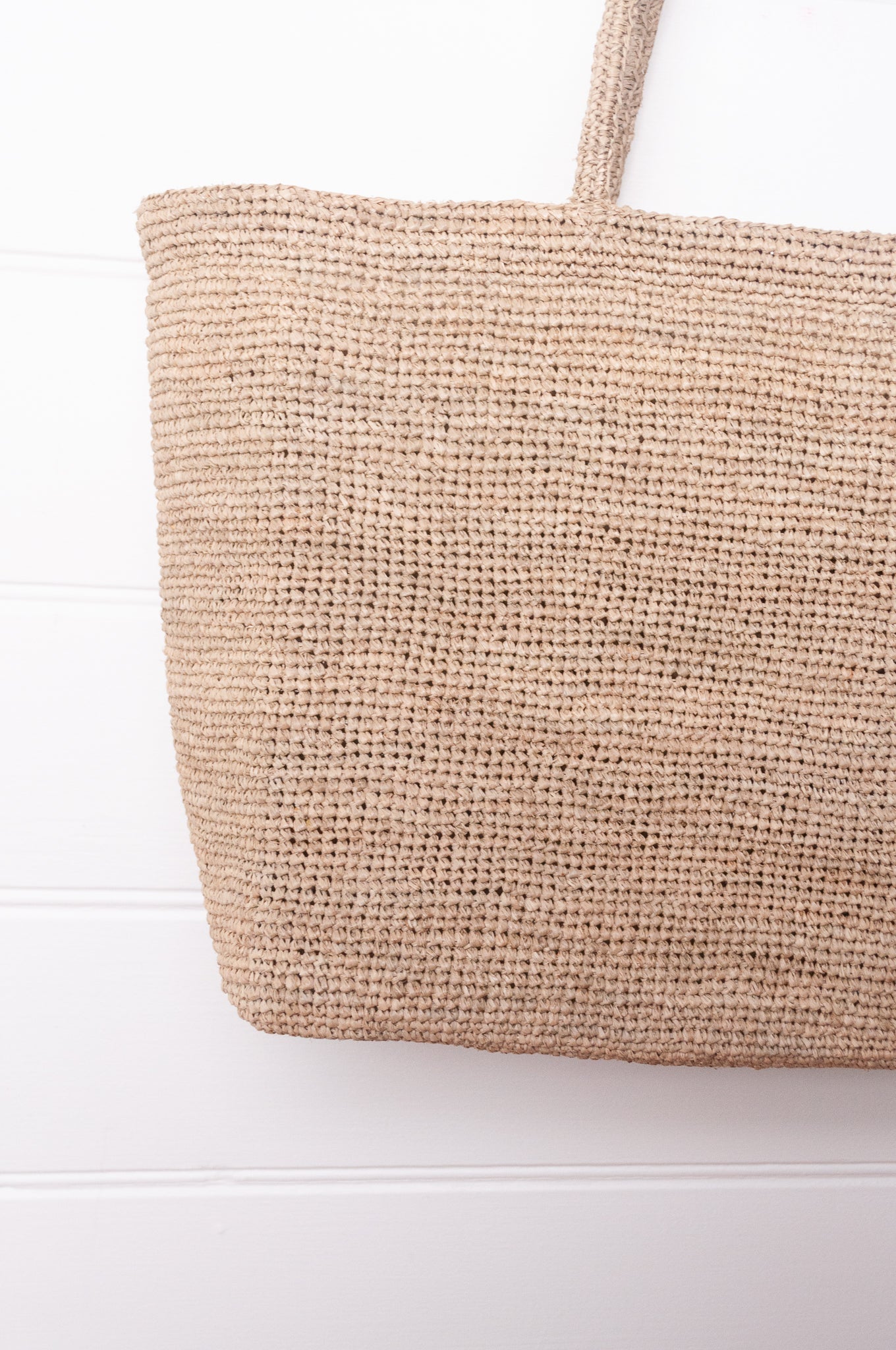 Sophie Digard plain shoulder tote bag in natural toned crocheted raffia.