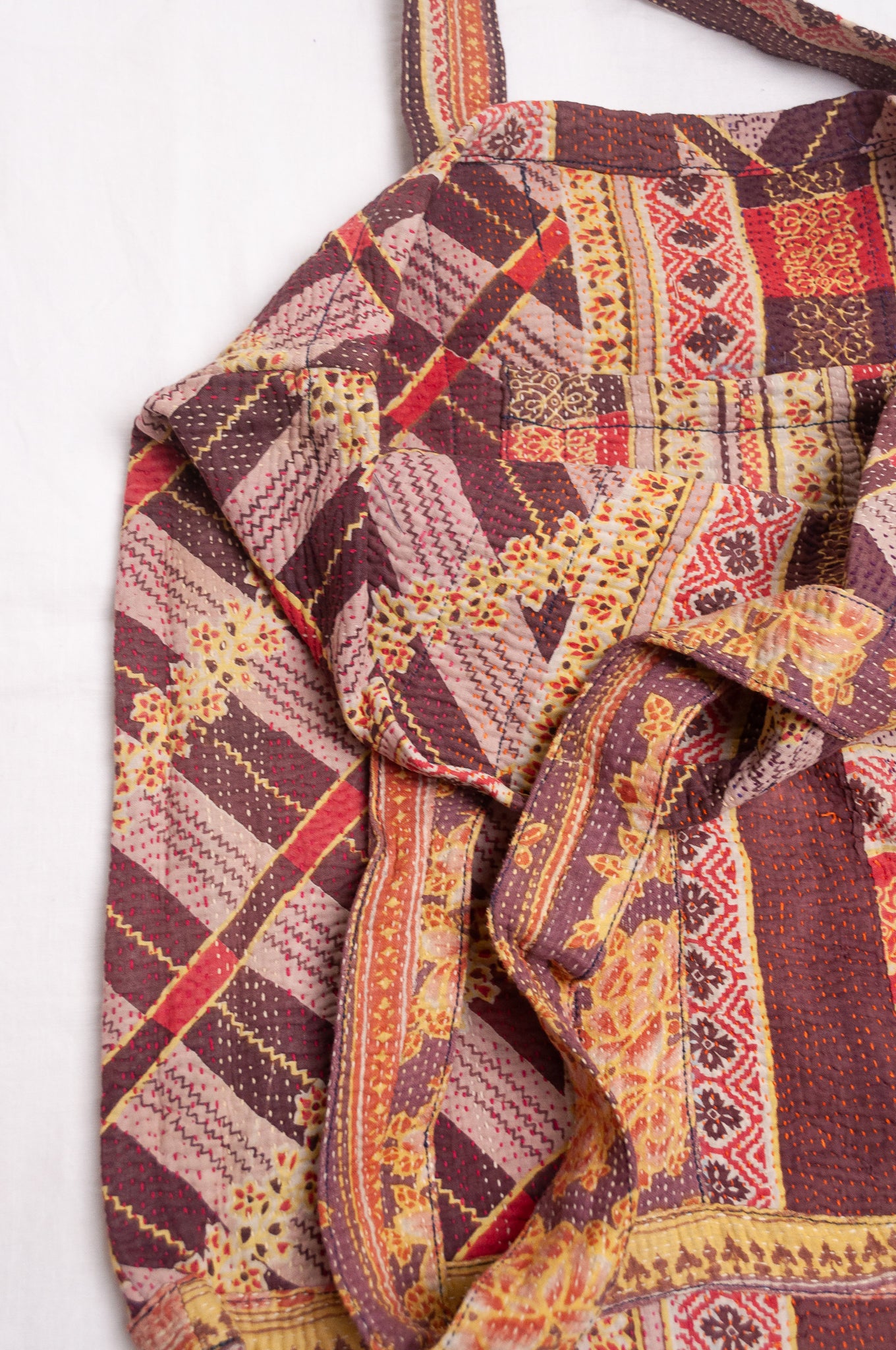 Vintage kantha quilt tote bag in chocolate stripe and floral pattern.