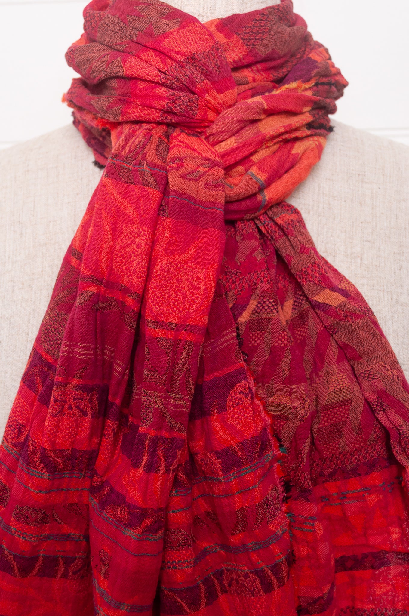 Letol organic cotton jacquard scarf in Ziggy coulis pink and red berry tones.