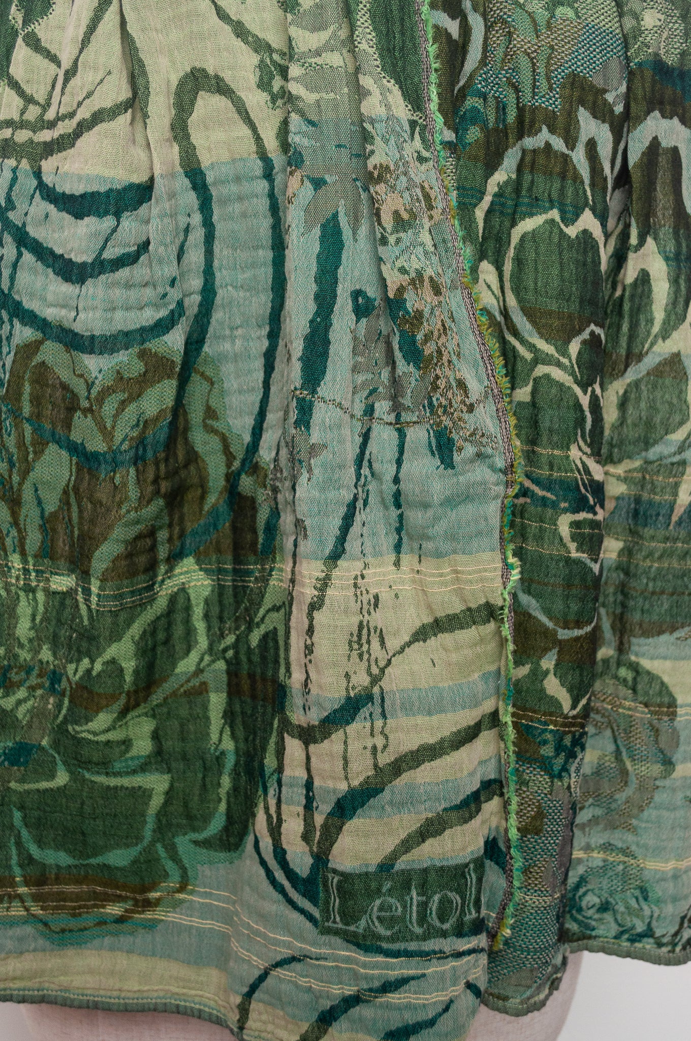 Letol organic cotton jacquard scarf in Ingrid kermit greens.
