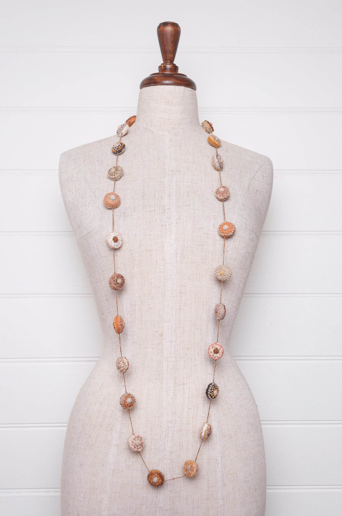 Sophie Digard embroidered linen medallions necklace in warm neutrals.