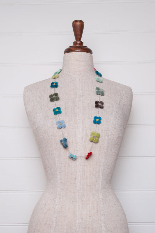 Sophie Digard classic cotton velvet four petal flower necklace in cheerful bright pastels.