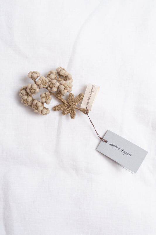 Handcrafted brooch by Sophie Digard, featuring embroidered flowers in thyme green linen.
