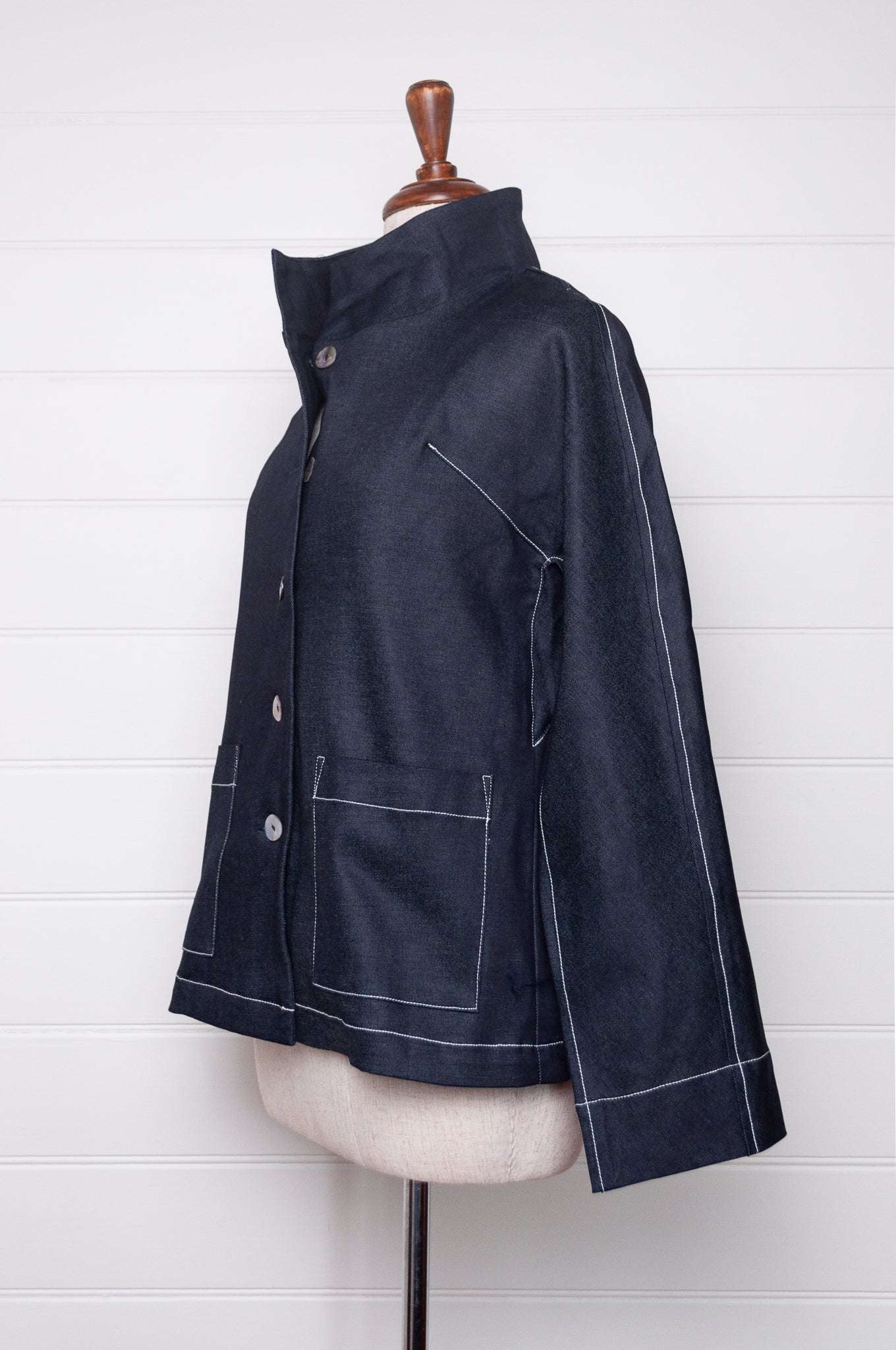 Valia Miro jacket in deep denim blue, feature top stitching.