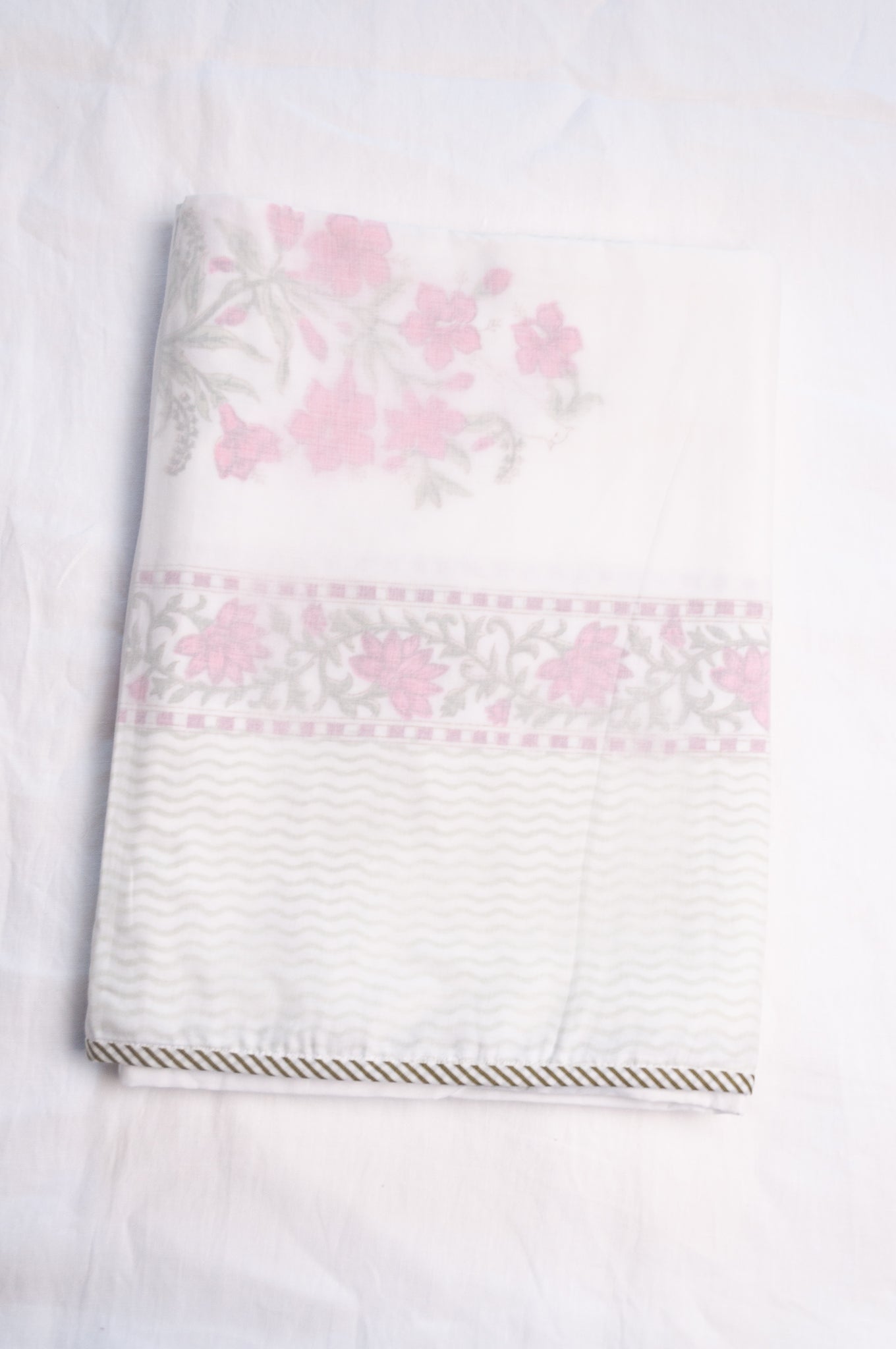 Single size cotton muslin blockprinted dohar, moghul design with pink flowers and cypress trees.