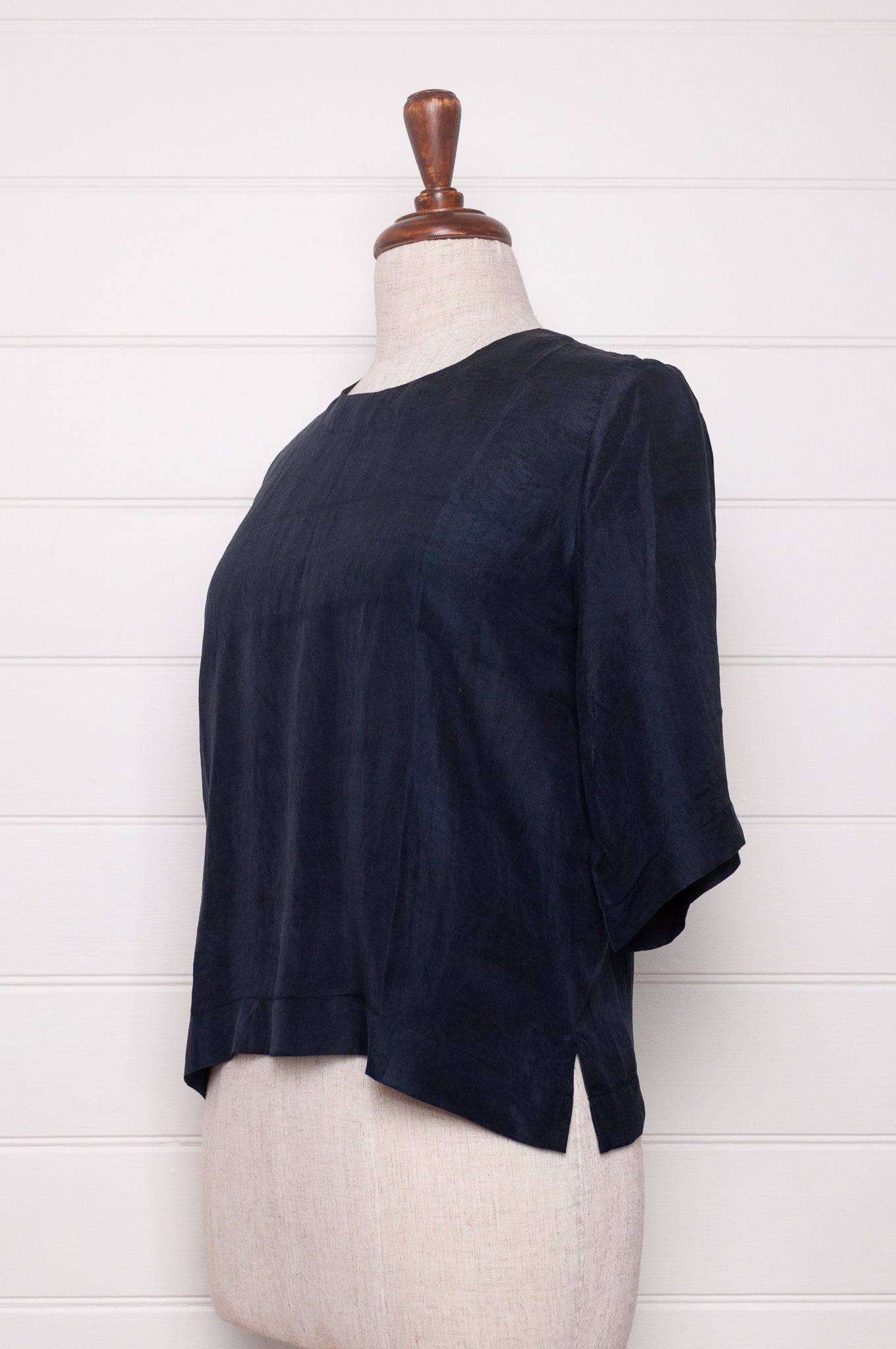 Handloom silk box top with mid length sleeves in ebony black.