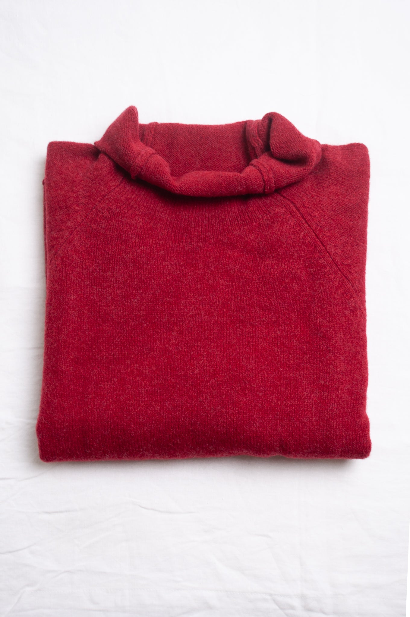 Eribe Corry merino wool sweater in Poppy melange.