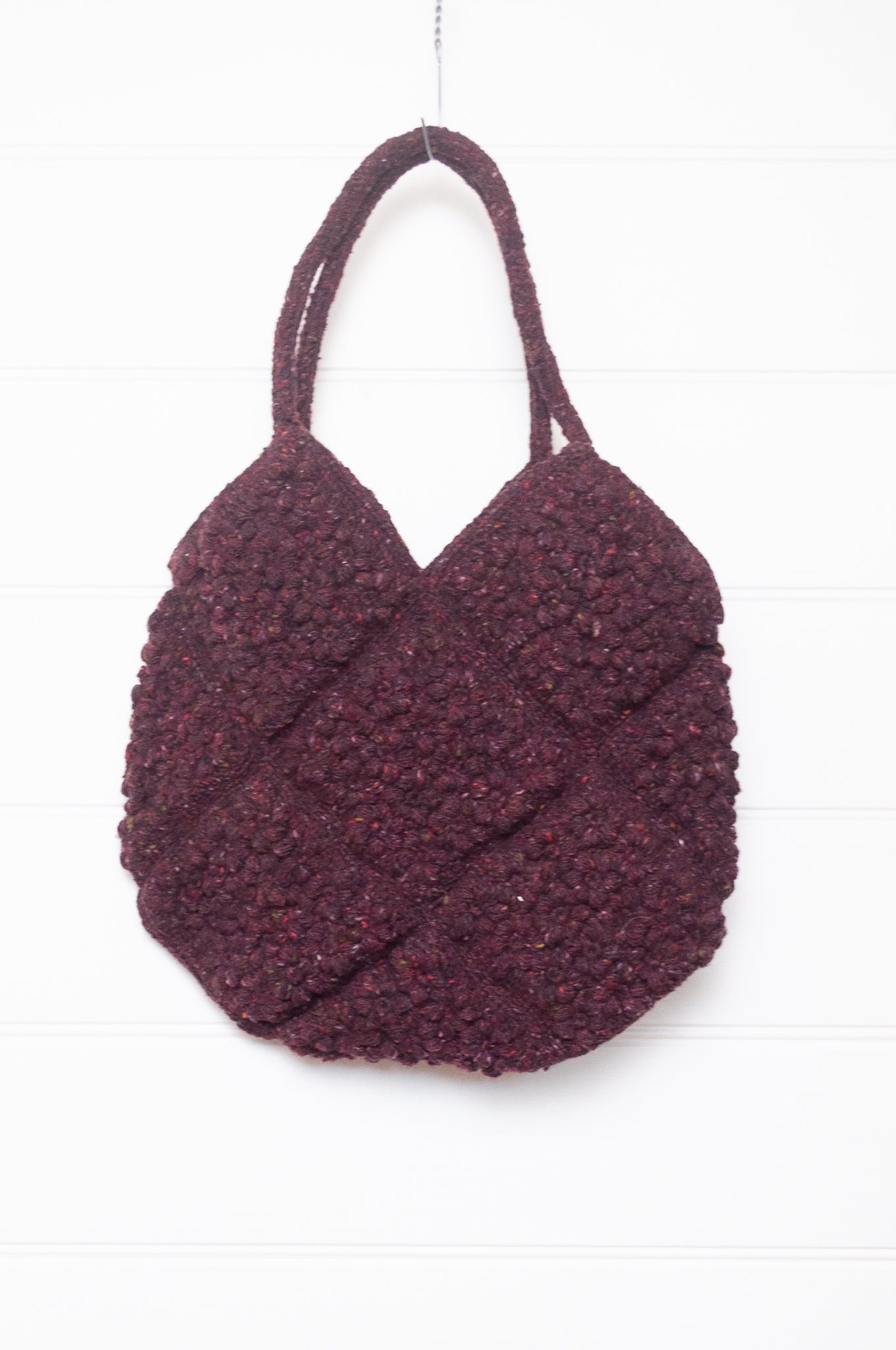 Sophie Digard crocheted freesia flower wool bag in tweedy burgundy.
