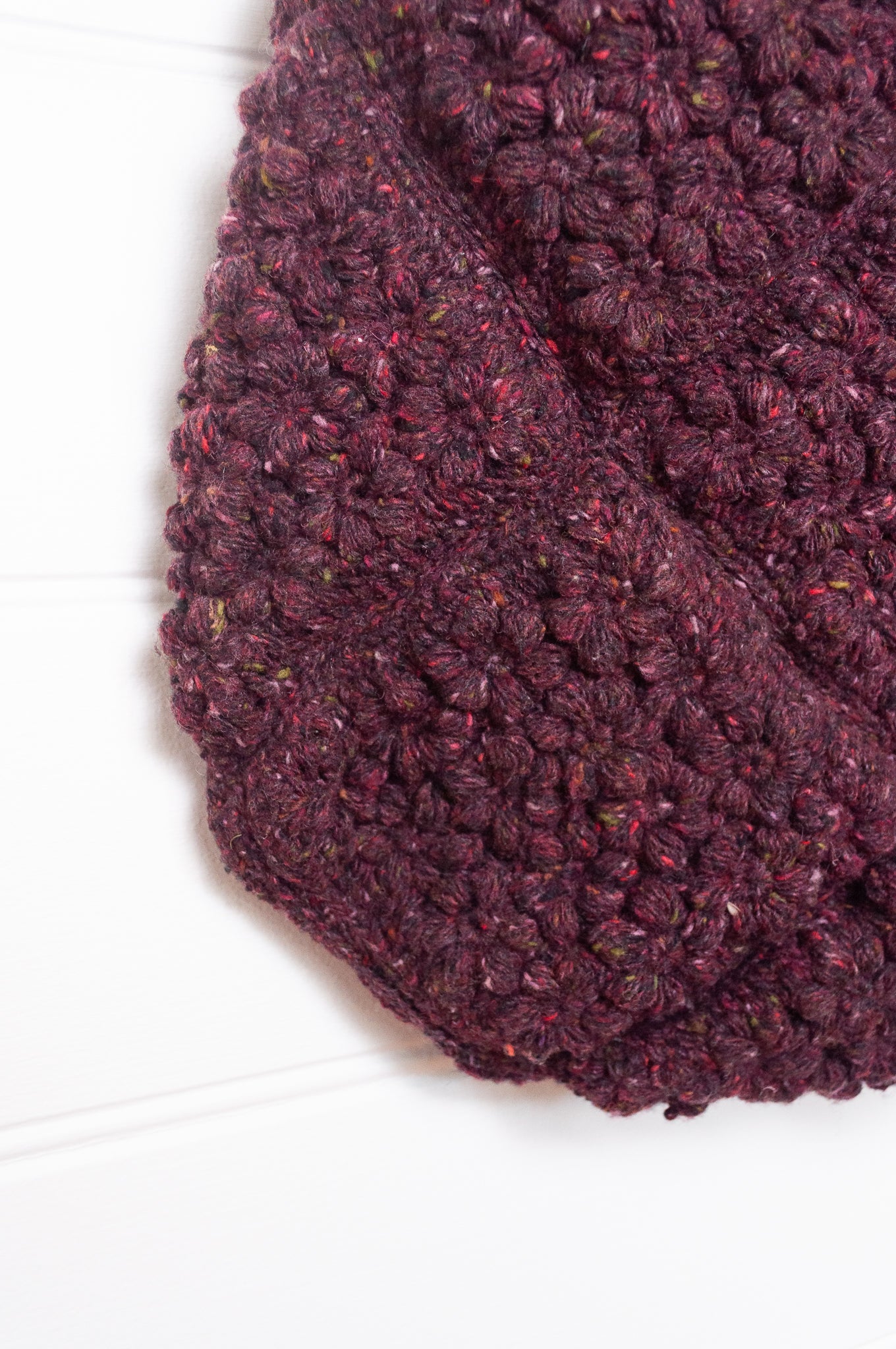 Sophie Digard crocheted freesia flower wool bag in tweedy burgundy.