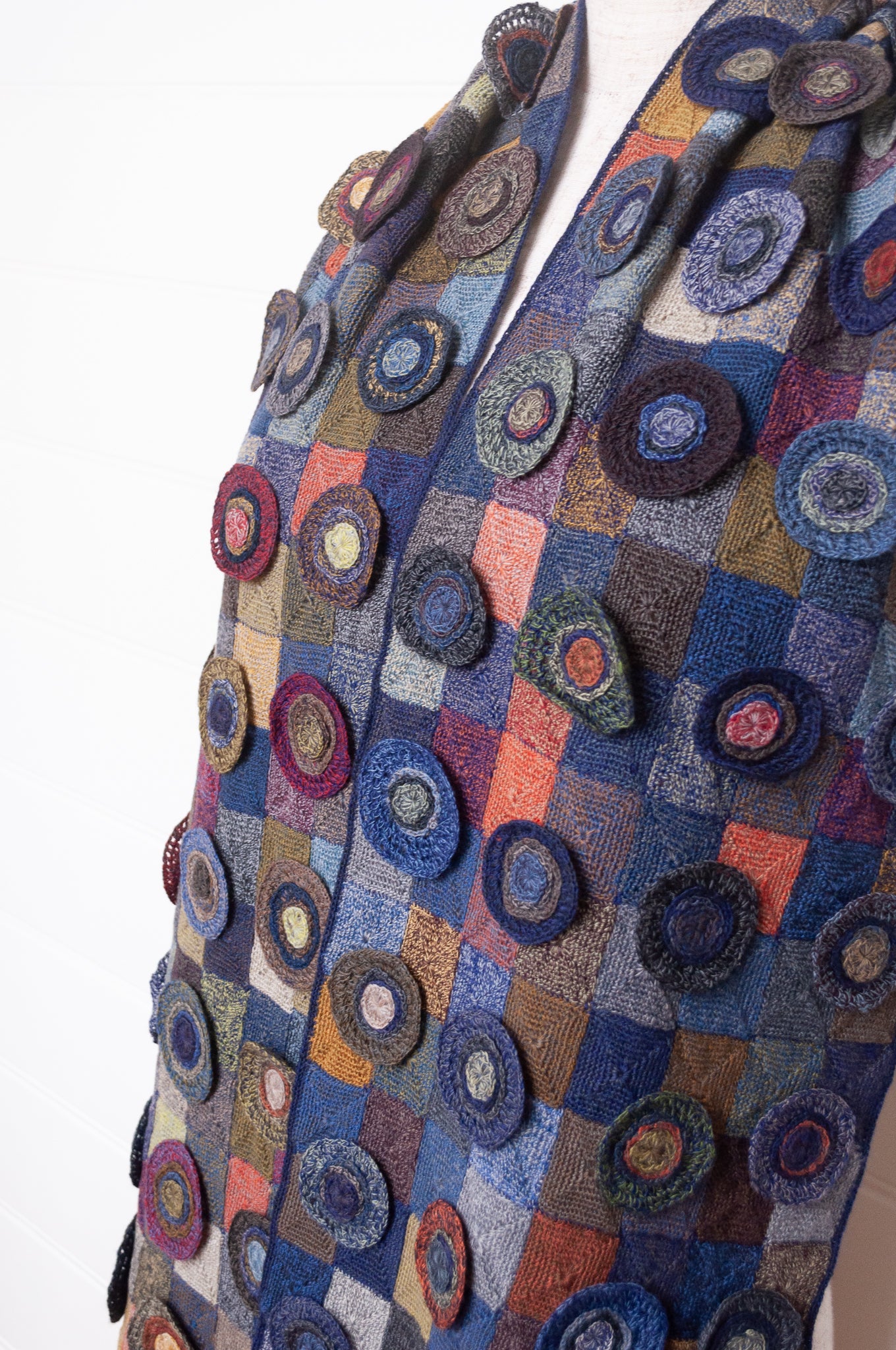 Sophie Digard crocheted wool scarf featuring patchwork with 3D rosettes in ink palette.
