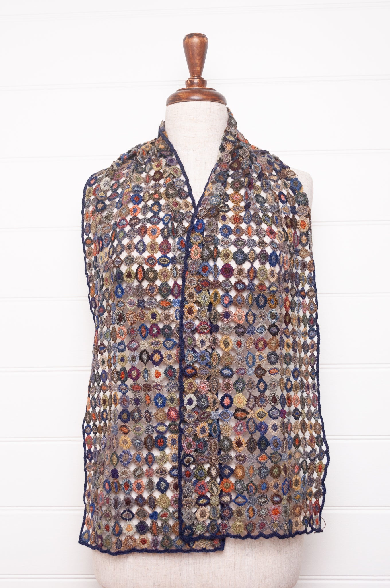 Sophie Digard crocheted wool scarf featuring flower motif lattice in ink palette.