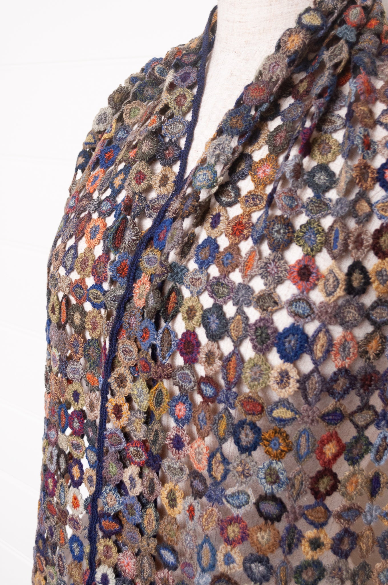 Sophie Digard crocheted wool scarf featuring flower motif lattice in ink palette.