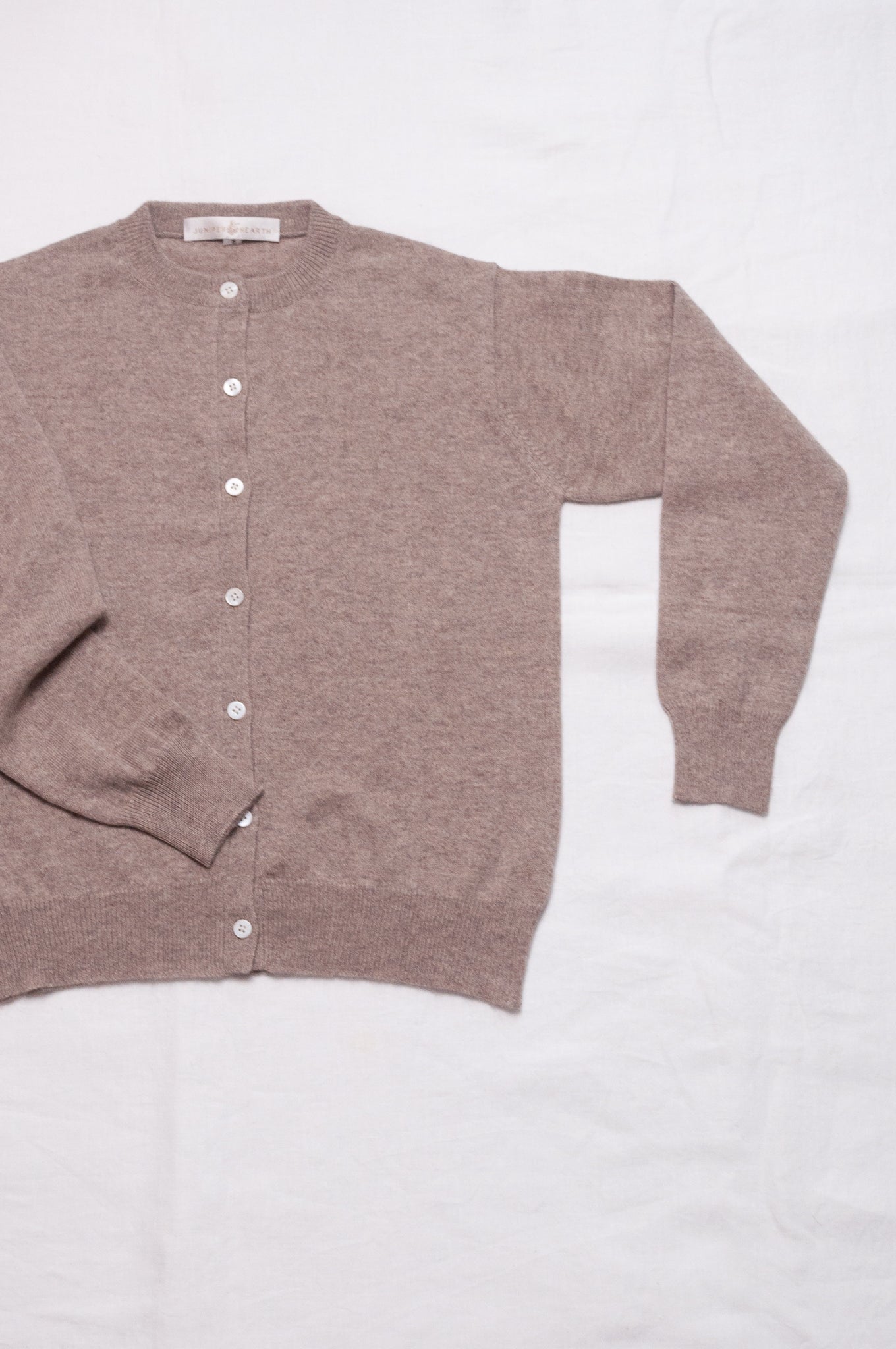 Juniper Hearth classic slimline cashmere cardigan in beige brown.