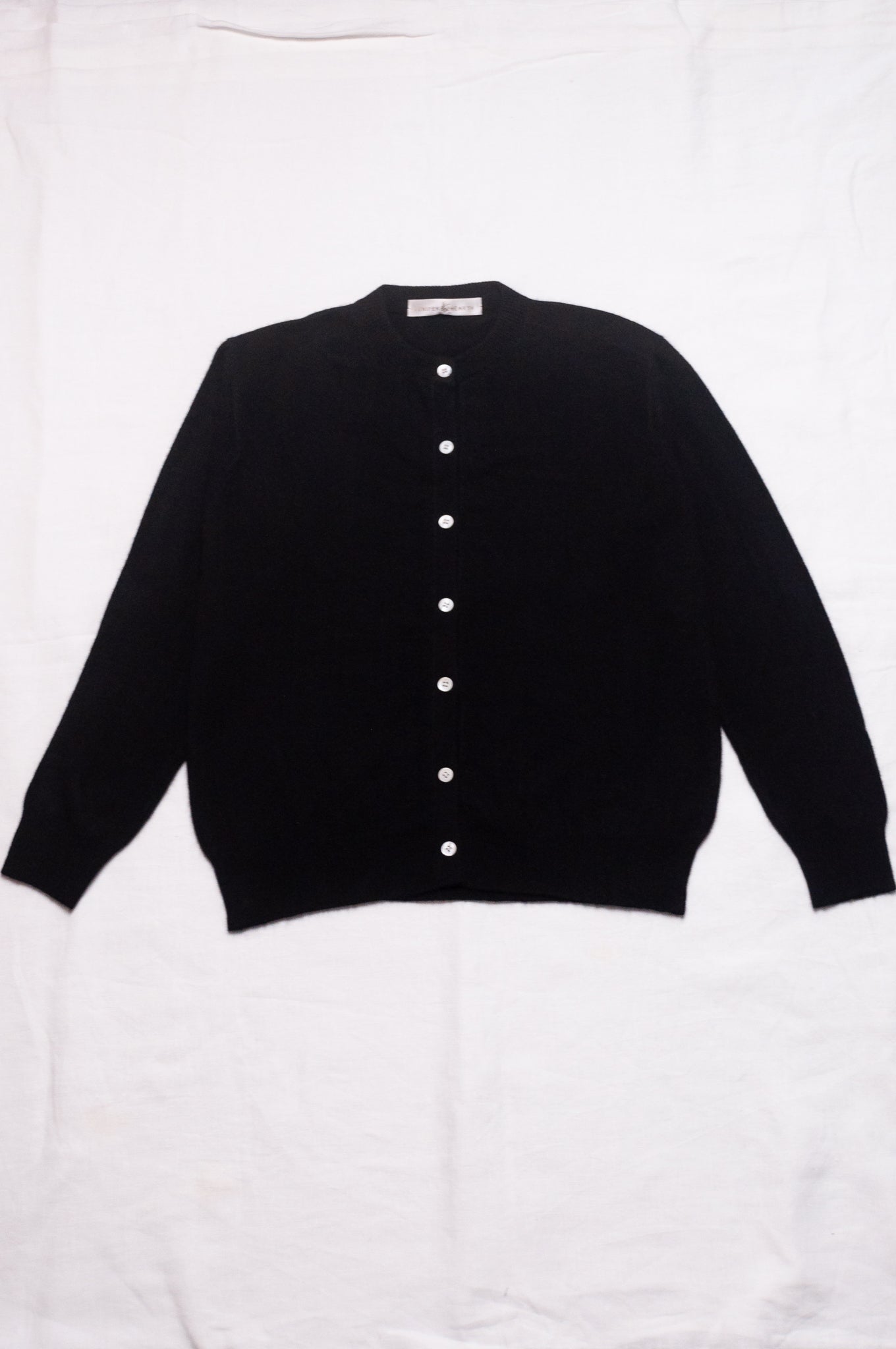 Juniper Hearth classic slimline cashmere cardigan in black.