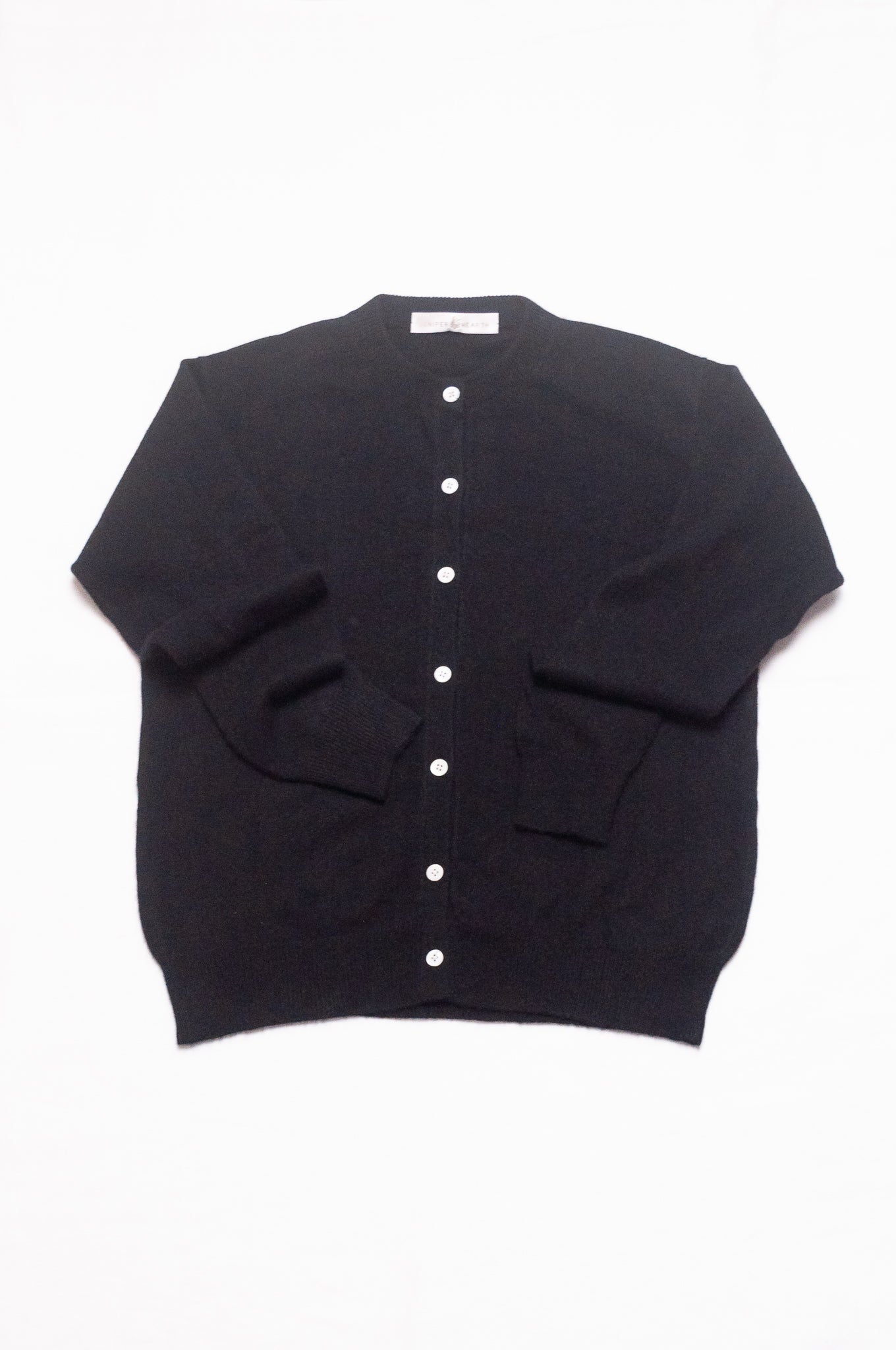 Juniper Hearth classic slimline cashmere cardigan in black.
