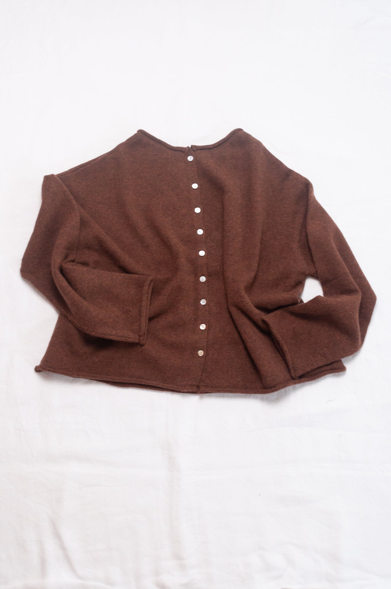 One size reversible pure cashere cardi sweater in umber brown.