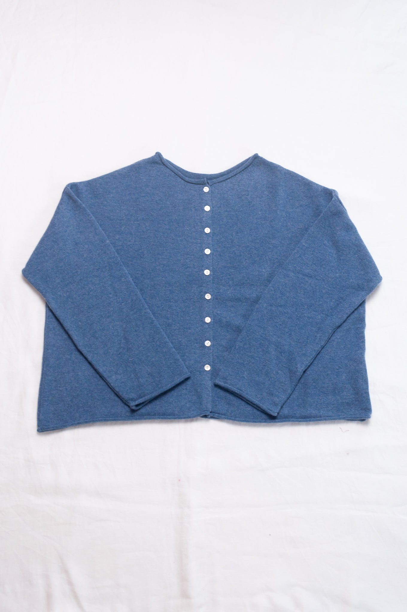 One size reversible pure cashere cardi sweater in denim blue.