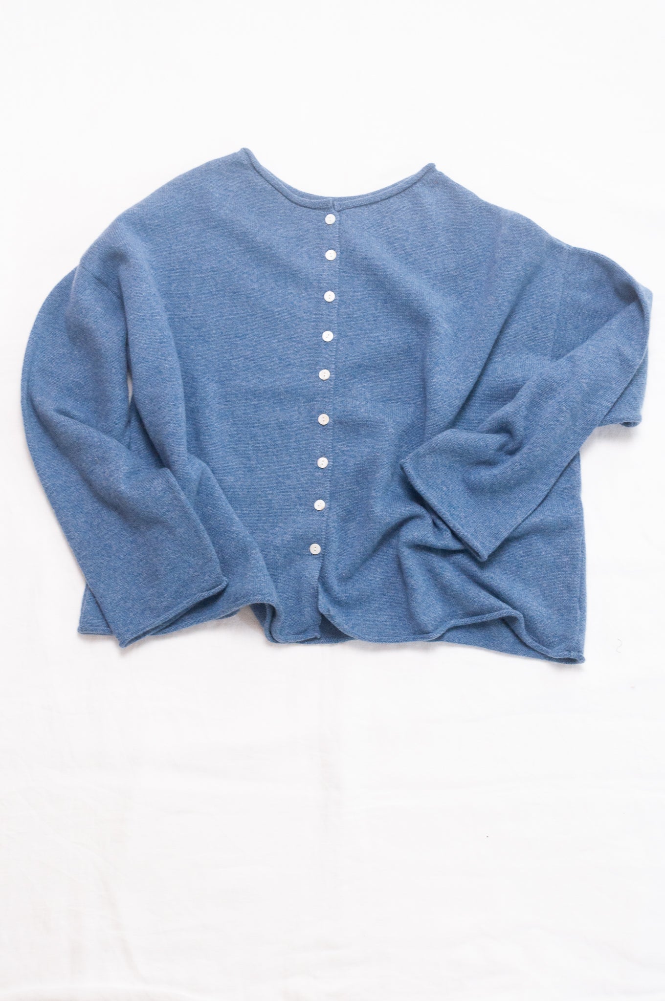 One size reversible pure cashere cardi sweater in denim blue.