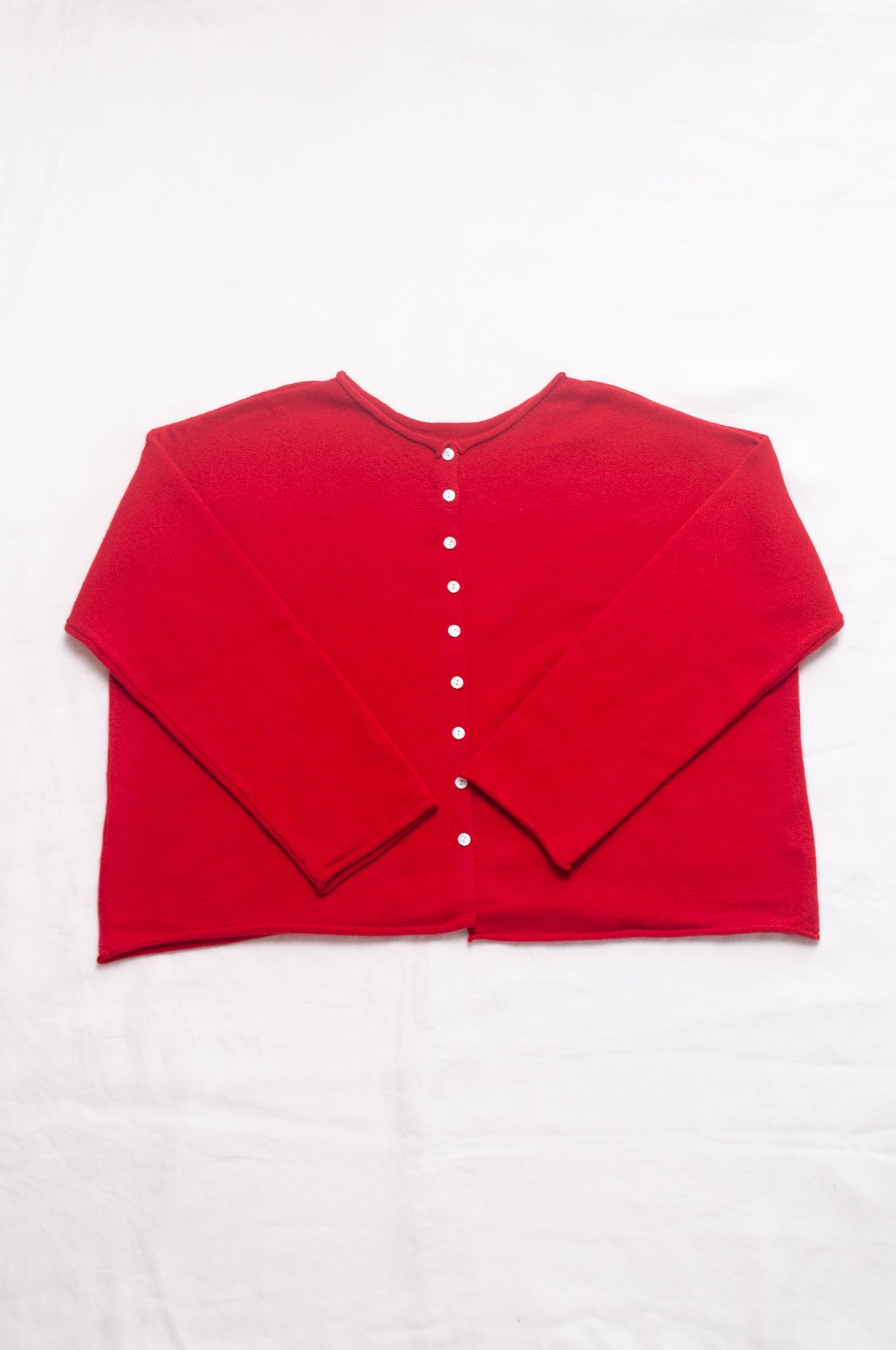 Juniper Hearth one size reversible cardigan sweater in scarlet red cashmere.