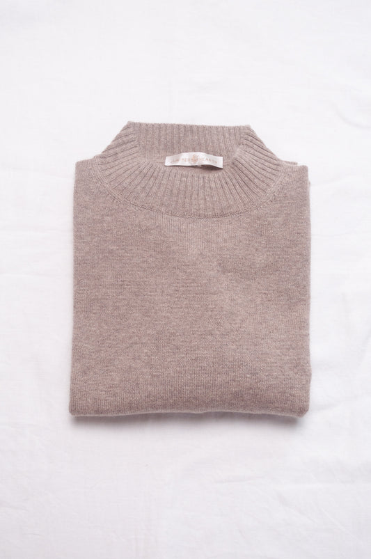 Juniper Hearth high neck turtleneck cashmere sweater in biscuit beige.