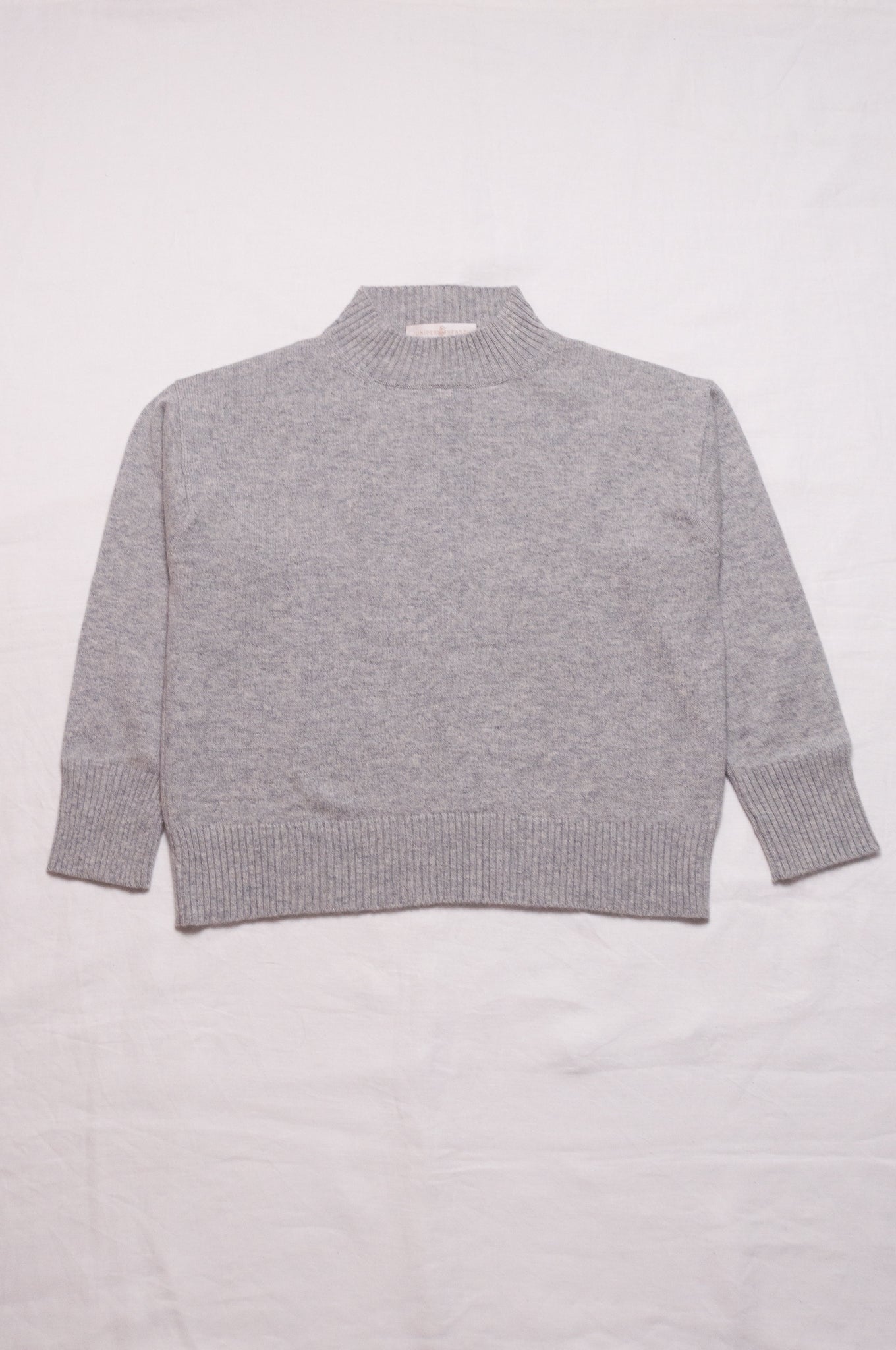 Juniper Hearth high neck turtleneck cashmere sweater in ash grey.