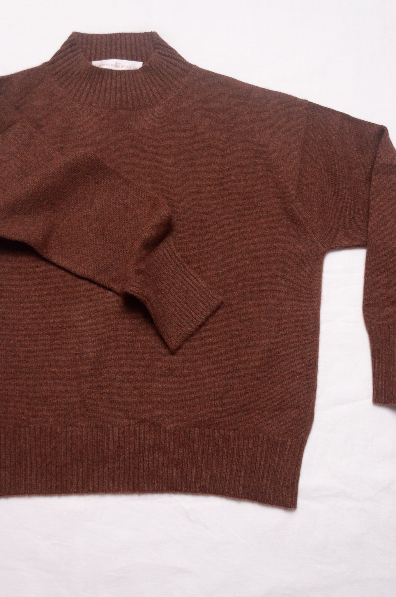 Juniper Hearth high neck turtleneck cashmere sweater in umber brown.
