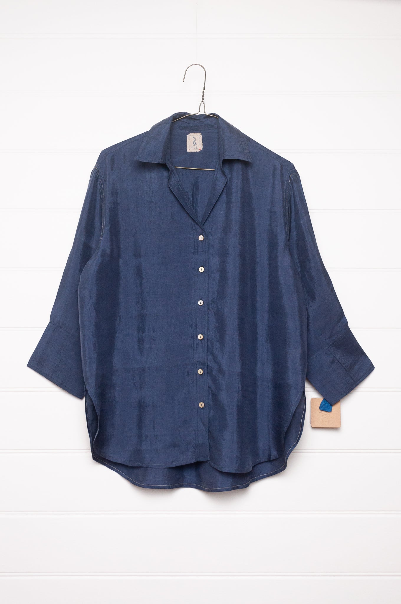 DVE Arha silk button up shirt in navy blue.