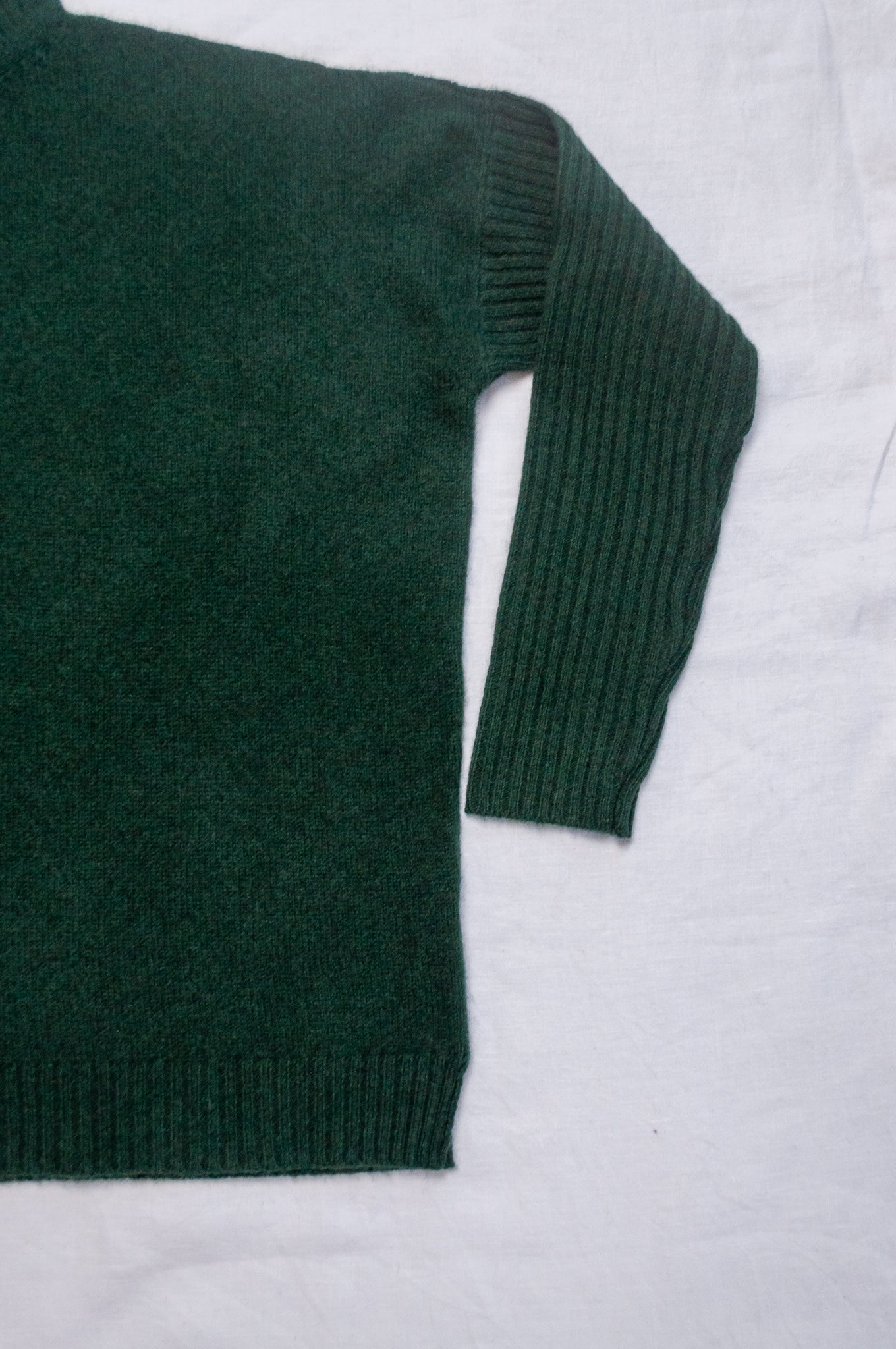 Baby yak wool Maxim one size turtle neck sweater with rib sleeves in dark hunter green forest green.