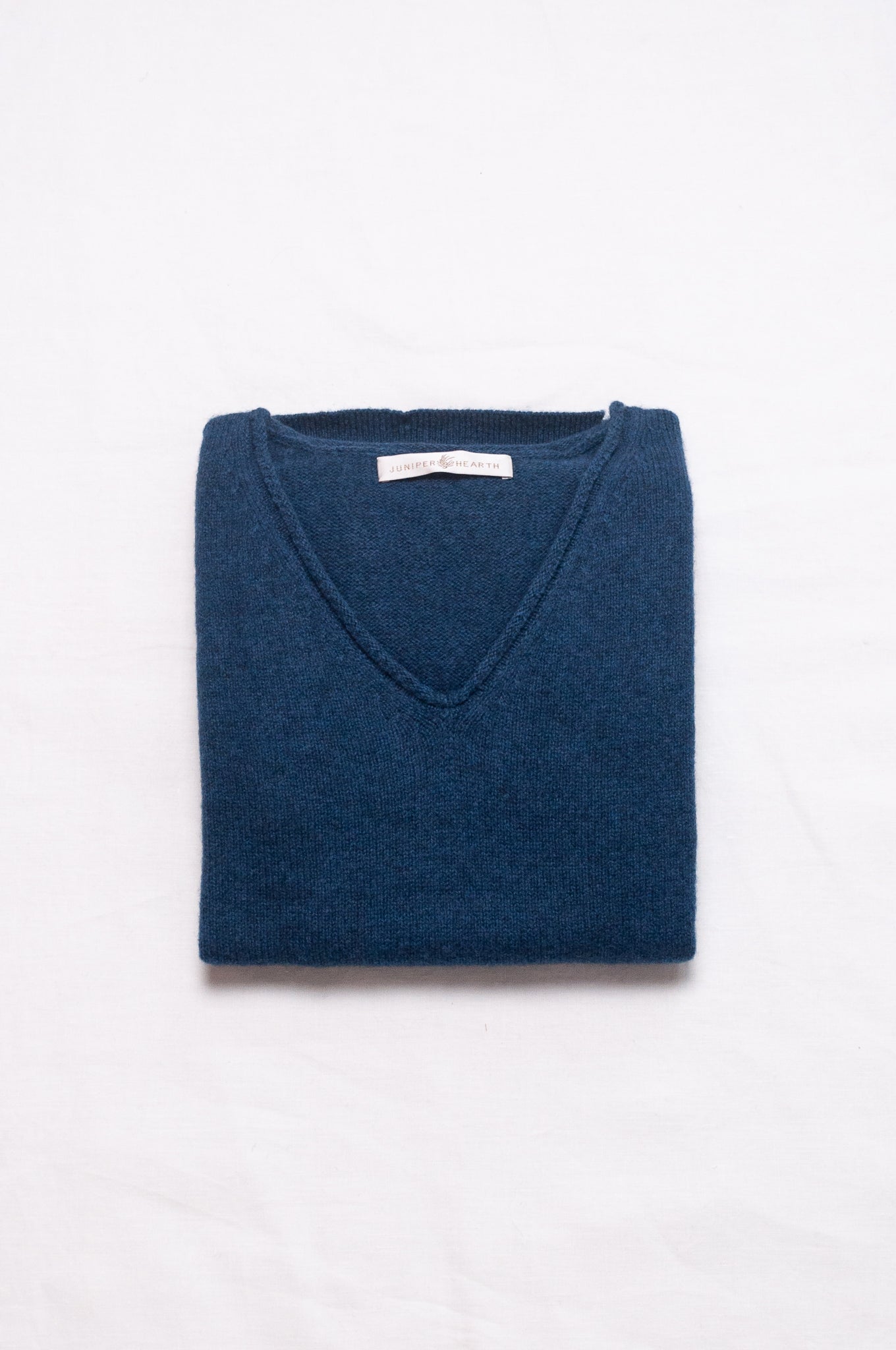 Baby yak wool Iris sweater V-neck loose fit in sapphire blue.
