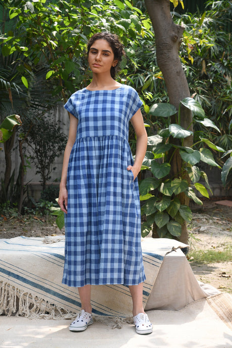DVE classic Toshni dress in natural indigo check handloom cotton, short sleeves, gathered skirt.