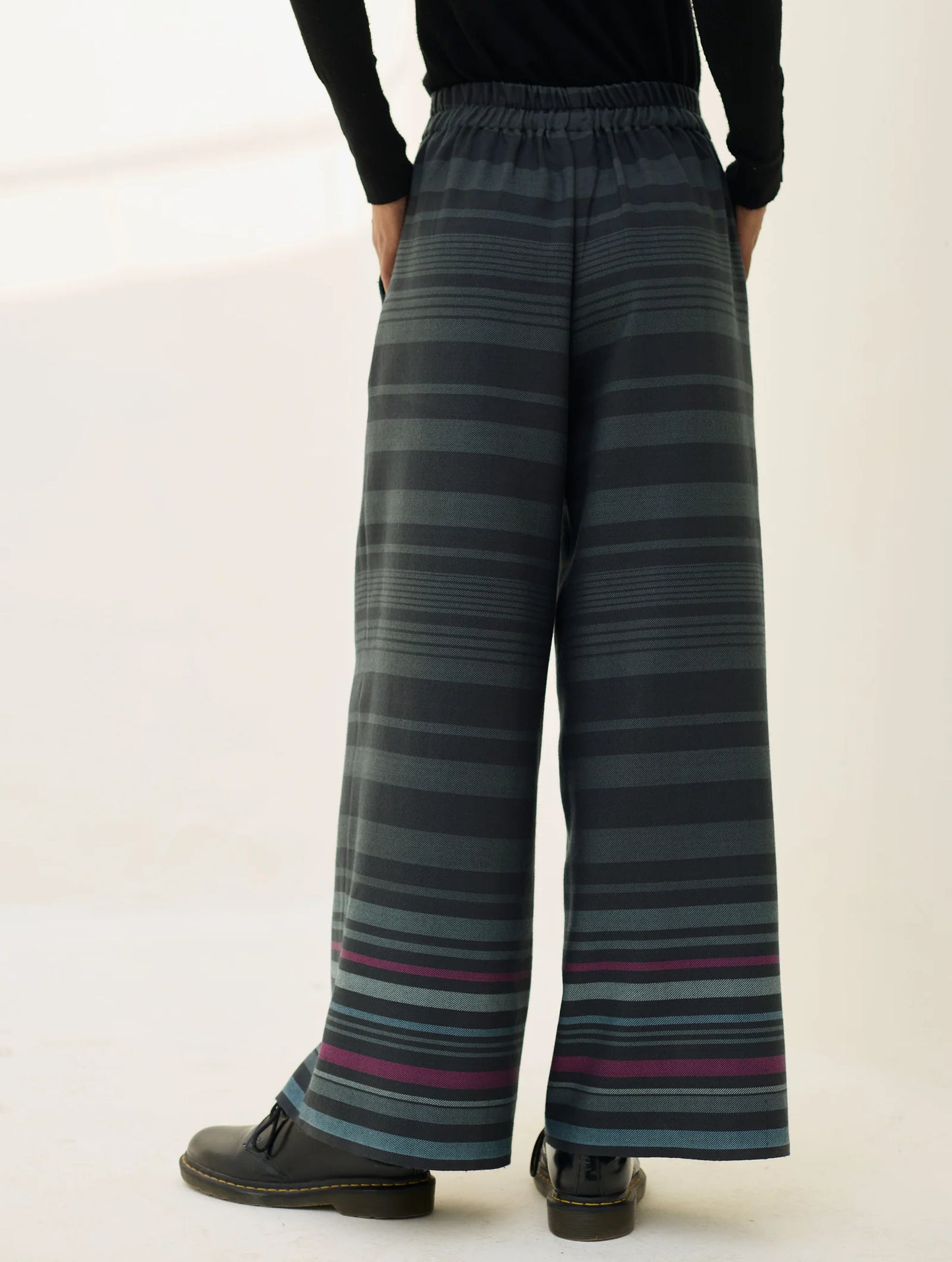 Manan Vola merino wool culootes with border stripe detail in charcoal.