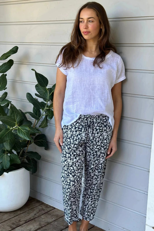 Frockk Jessie linen pants in navy and white floral print.