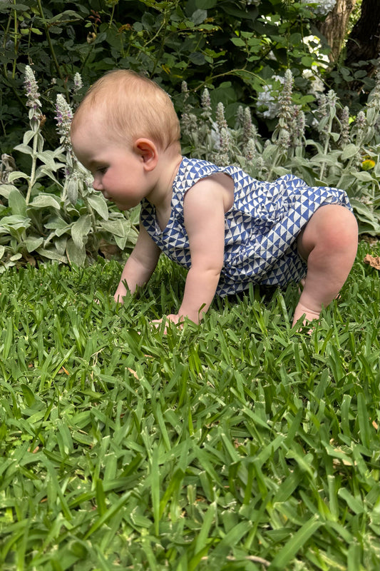 Juni Kids pure cotton blockprint baby romper in cobalt blue triangles on white.