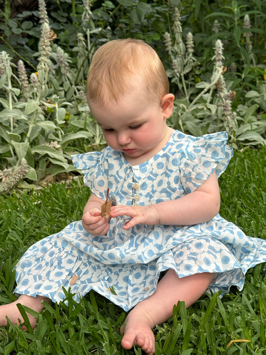 Juni Kids pure cotton blockprint baby dress in light blue and white floral pattern.