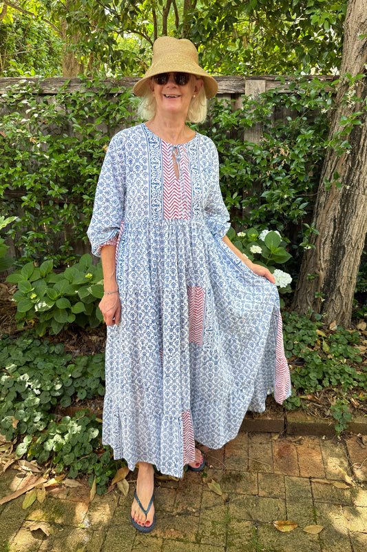 Dora Maxi dress light cotton voile blockprint maxi dress sky blue on white floral with red accents.