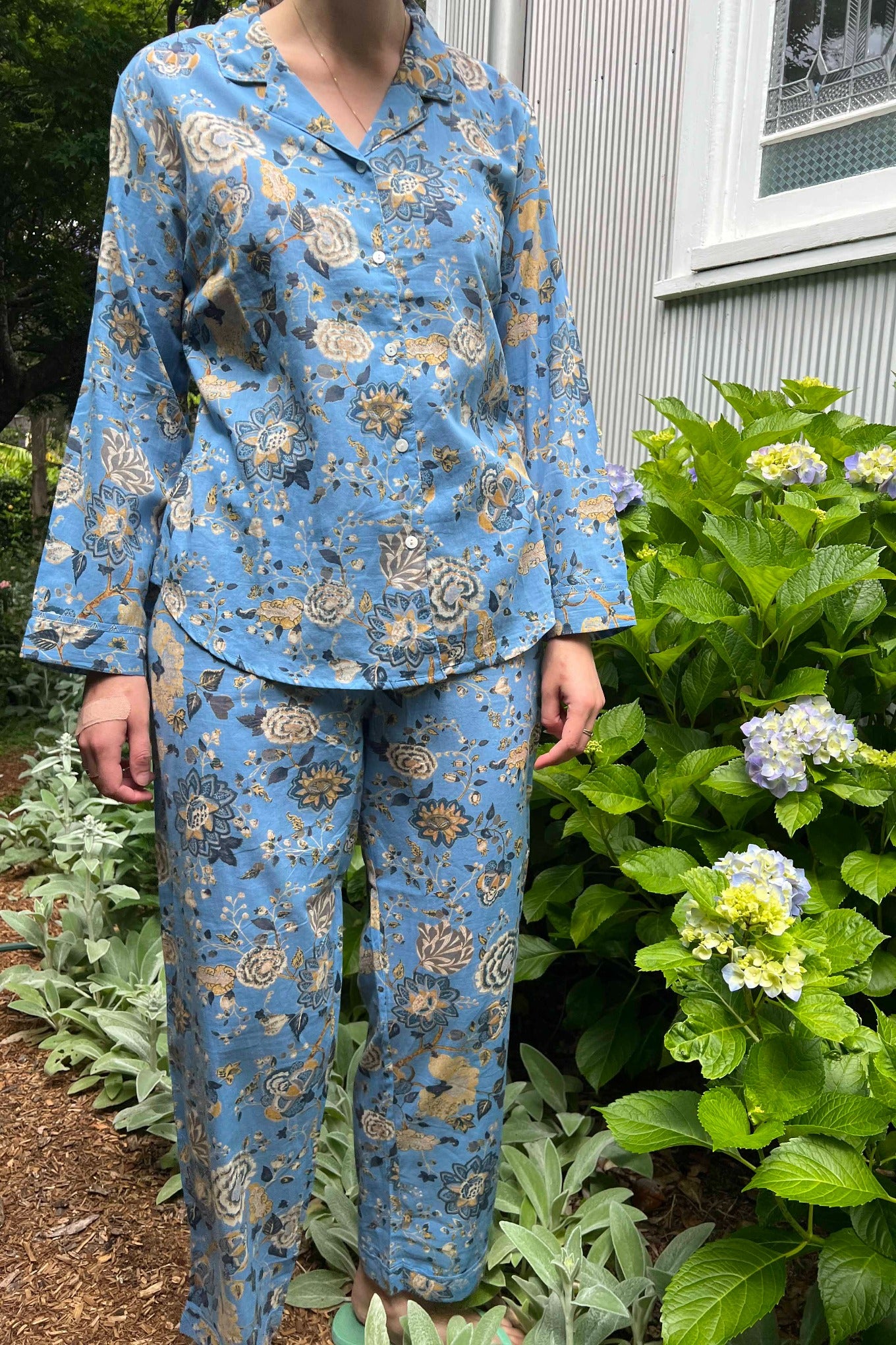 Juniper Hearth cotton voile pyjamas in Magenta sky floral print on sky blue.