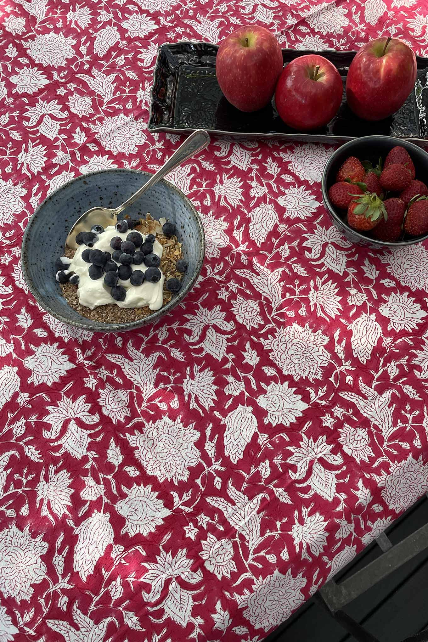 Blockprinted cotton table cloth in raspberry red and white floral design, made by hand