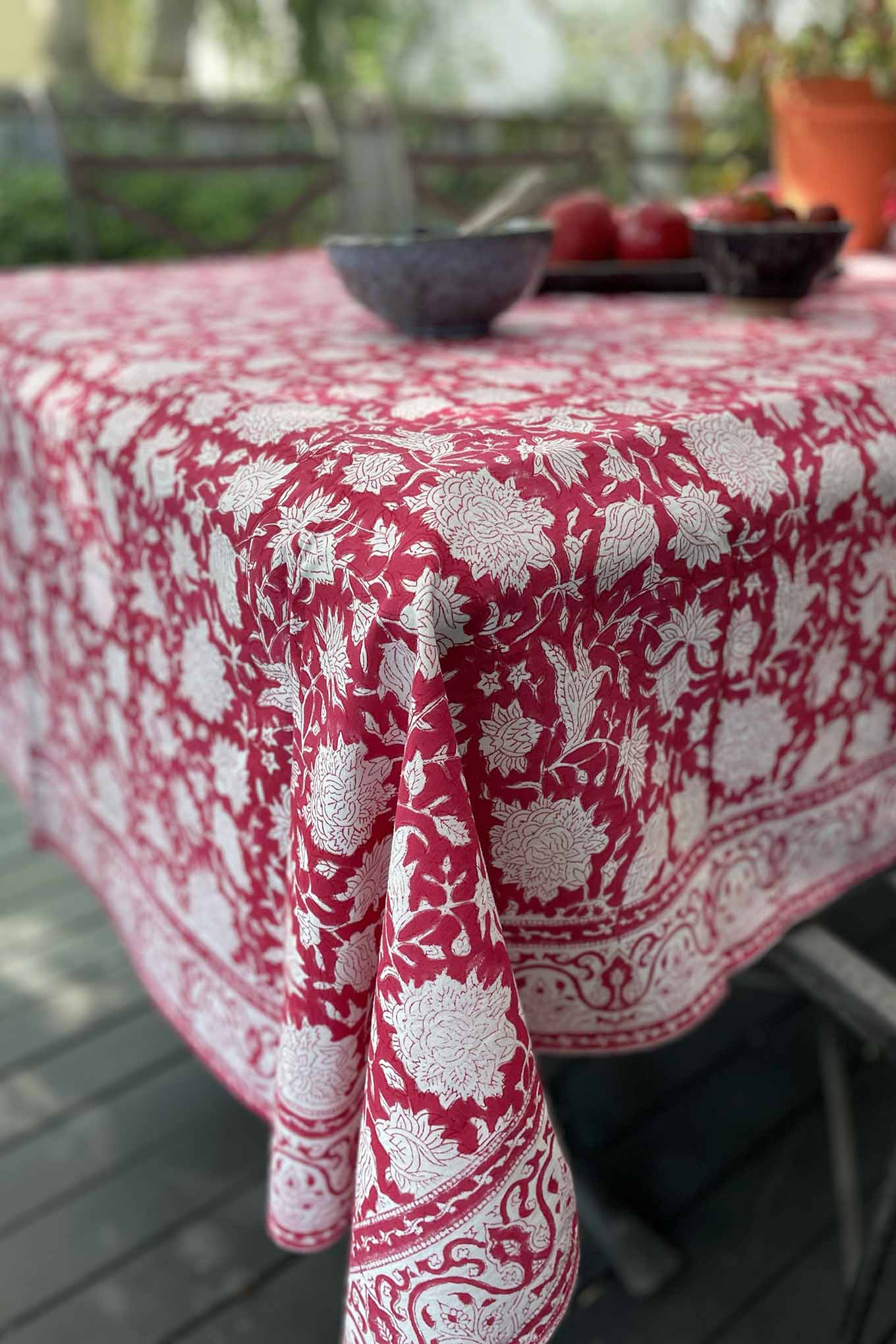 Blockprinted cotton table cloth in raspberry red and white floral design, made by hand