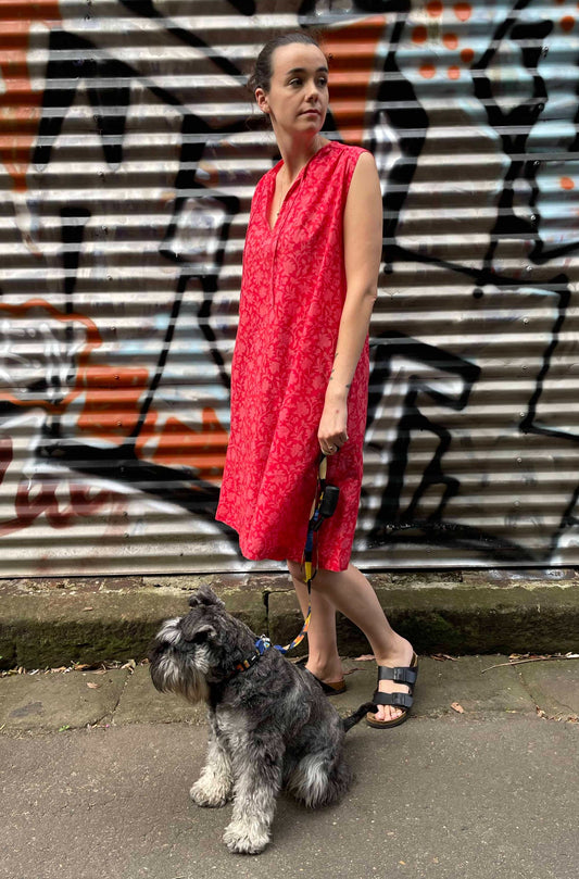 Juniper Hearth Stella dress in cherry pink red blockprint floral cotton, A-line sleeveless with front ties.
