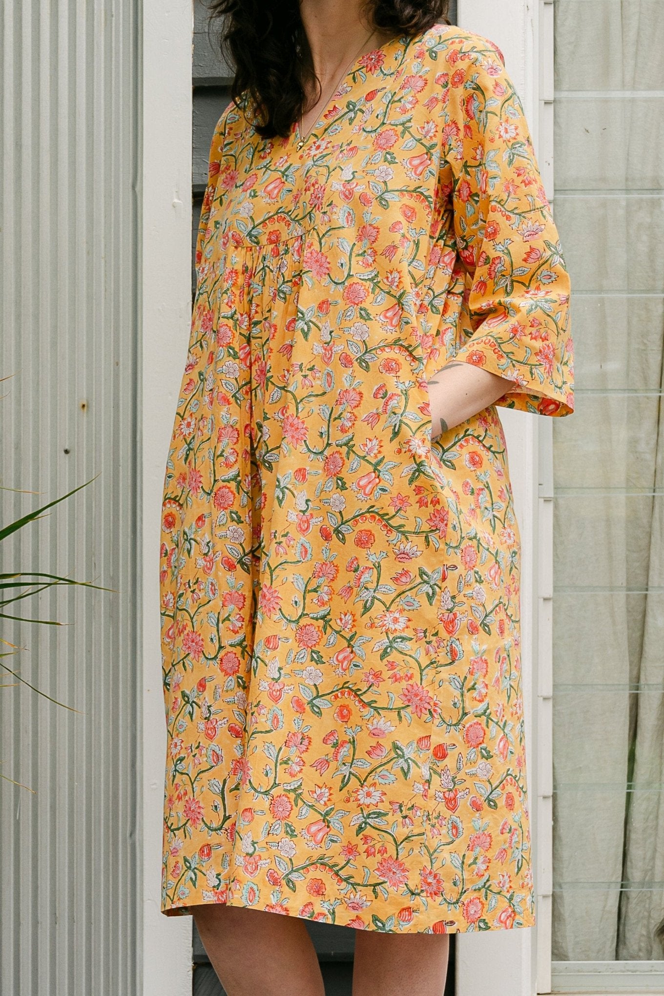Juniper Hearth blockprint cotton Thea 3/4 sleeve dress in saffron yellow floral design.