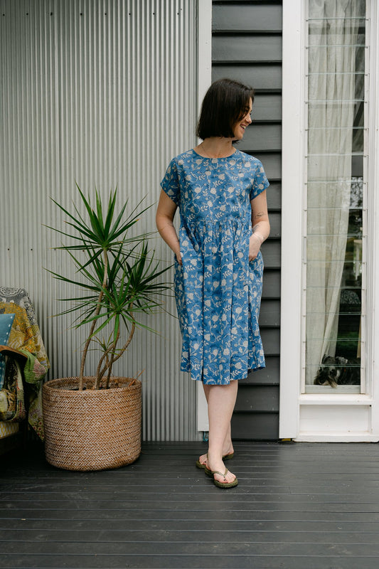 Juniper Hearth blockprint cotton dress with gathered skirt and pockets, in blue and white floral.
