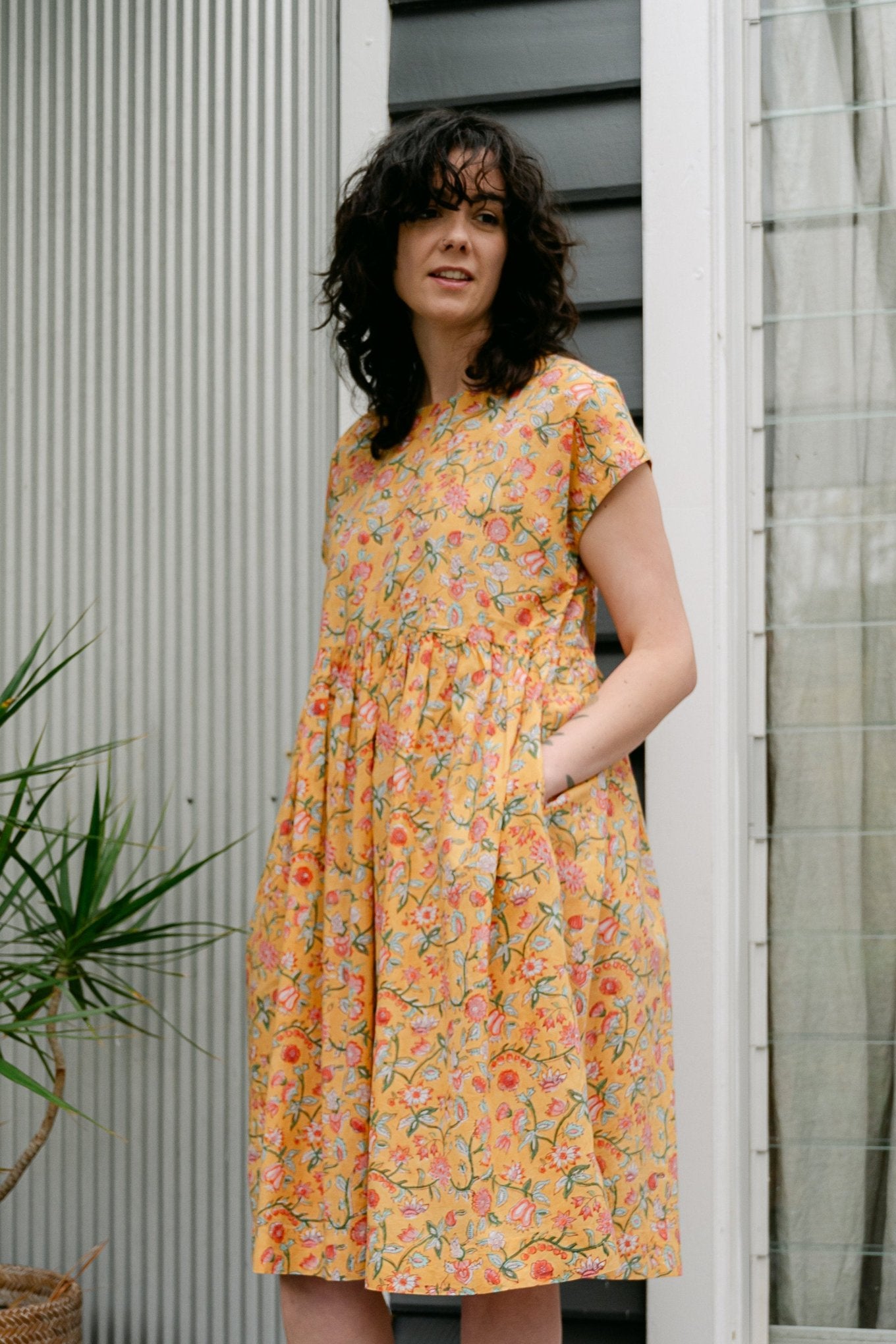 Juniper Hearth blockprint cotton dress with gathered skirt and pockets, in mustard floral.