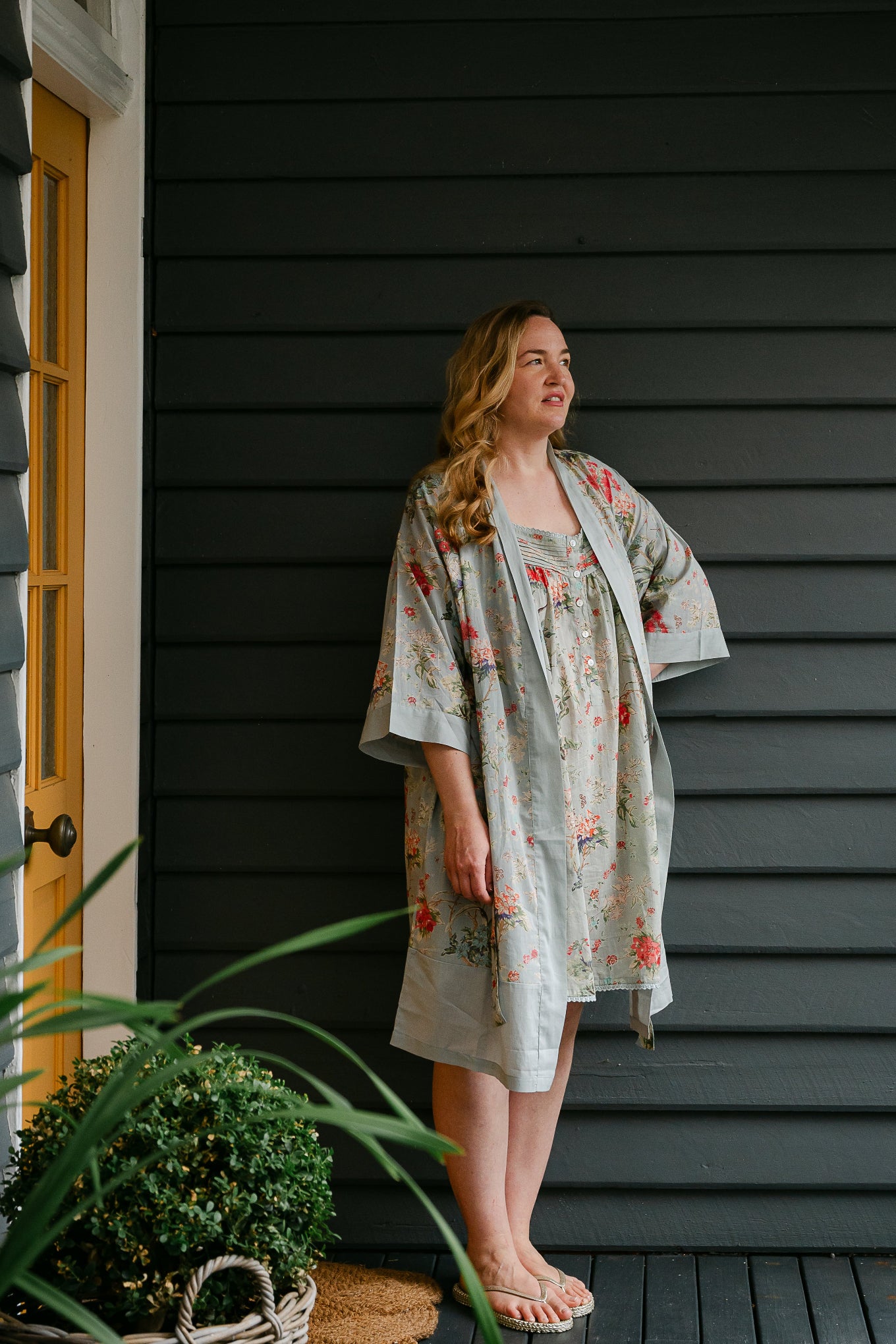 Juniper Hearth cotton voile kimono in country garden print, pink and vanilla flowers on duck egg blue background.