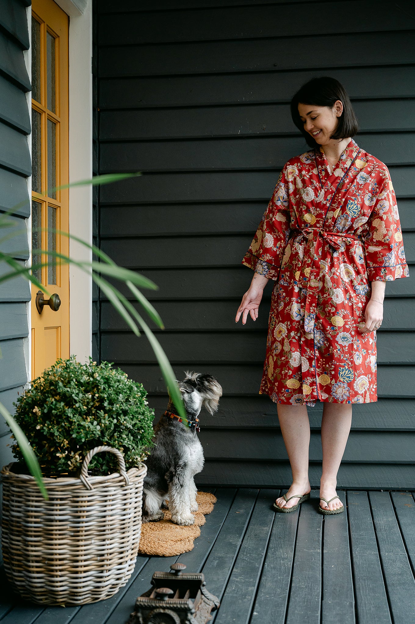 Juniper Hearth kimono in Malabar rust gold and cream and denim blue flowers on rust red background.