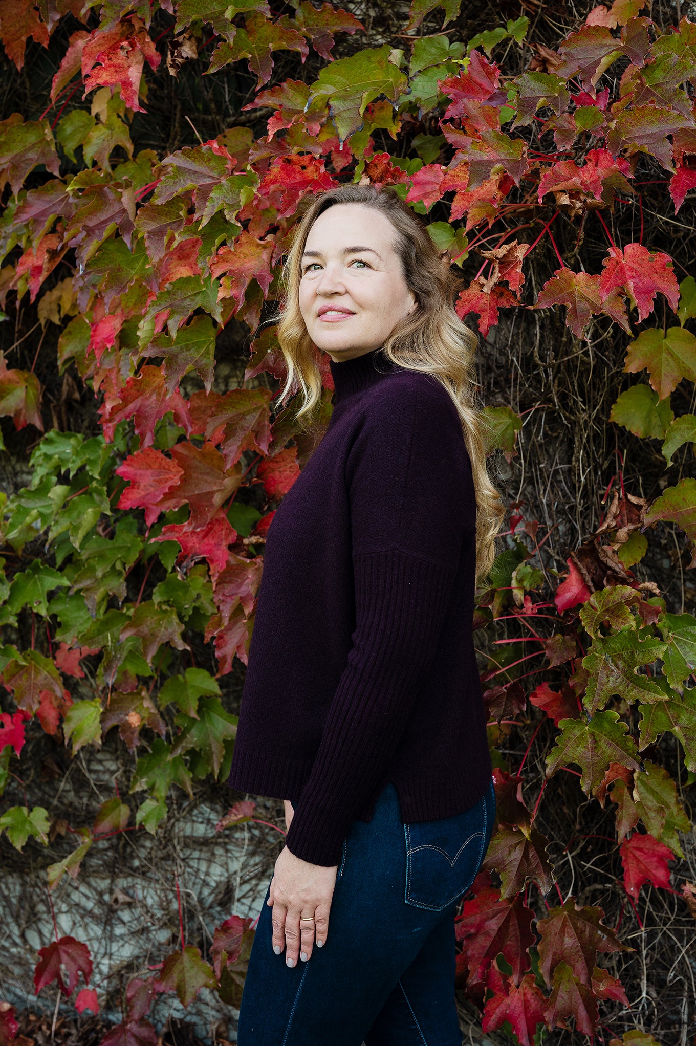 Baby yak wool Maxim one size turtle neck sweater with rib sleeves in aubergine.