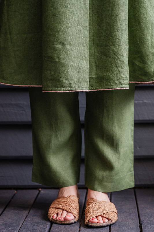 Manan Maki pleated linen short sleeve dress with V-neck in green.