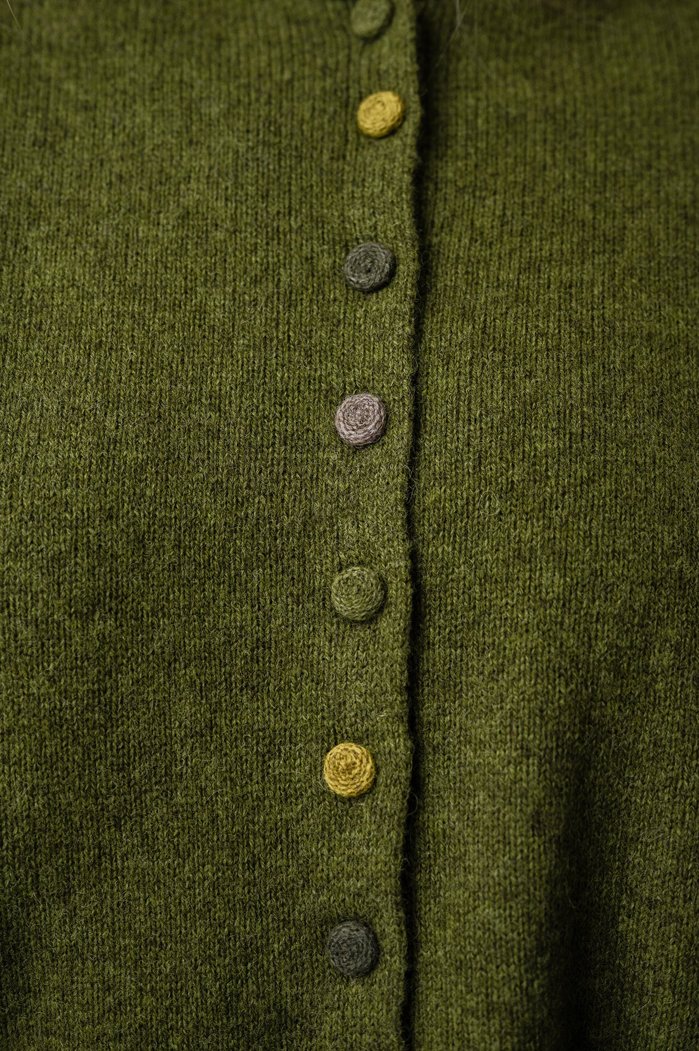 Baby yak one size reversible cardigan sweater with hand embroidered buttons in chartreuse green.
